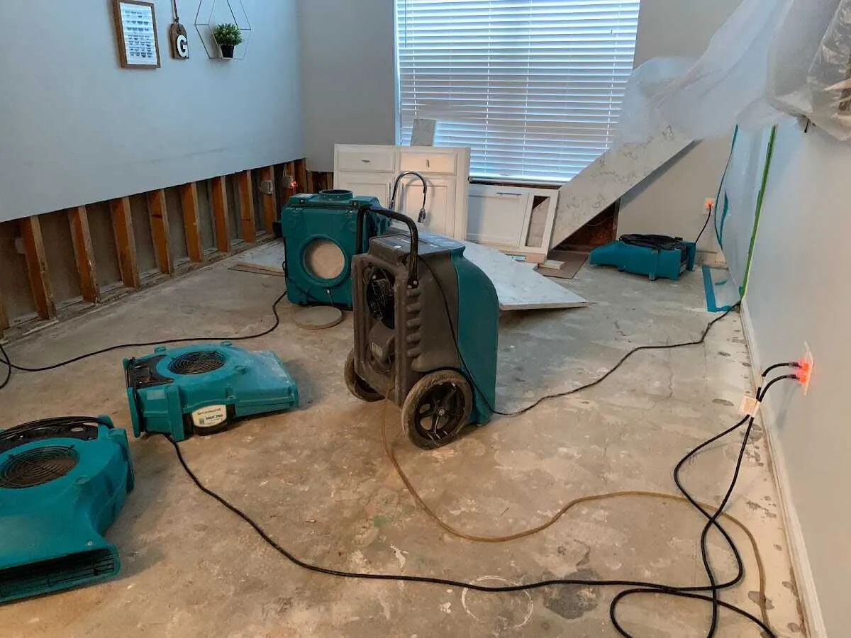 Dehumidifier in flood-cut room for Water Damage Restoration in Wallington